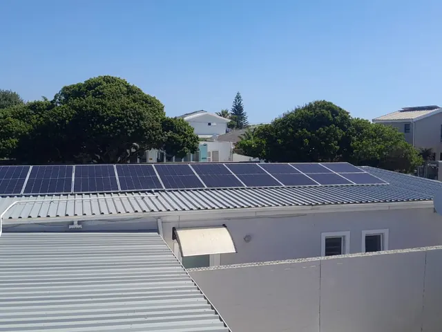 Rooftop solar panels installed on a second home in Melkbosstrand, Cape Town