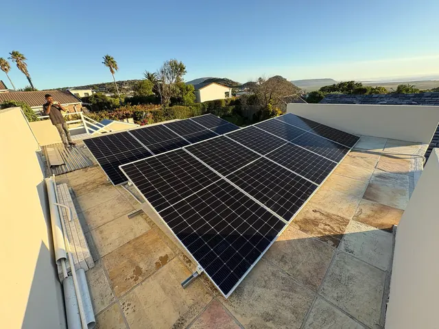 Rooftop solar panels installed on a second home in Noordhoek, Cape Town